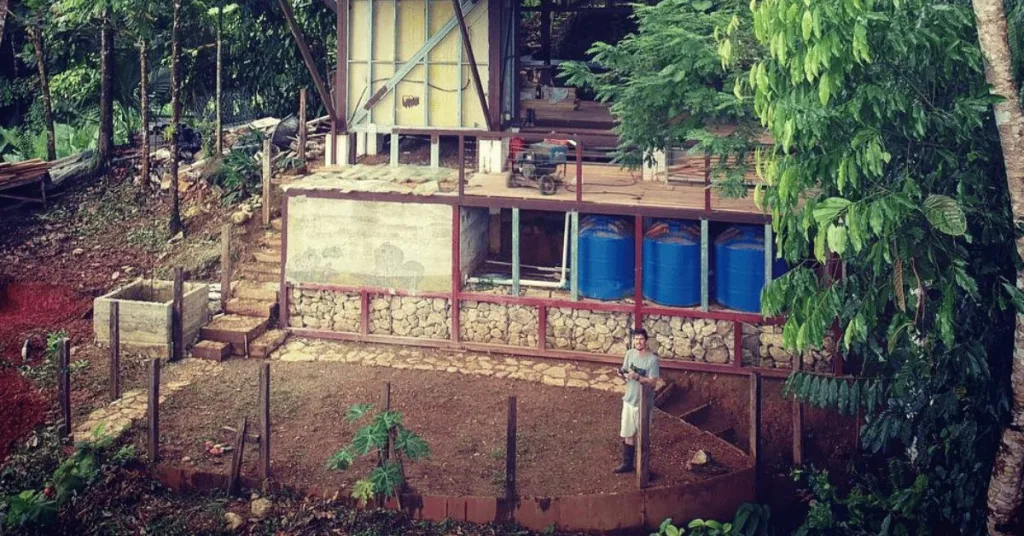 Water storage tanks built under an off-grid home