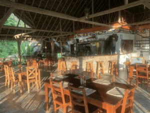 a restaurant with tables and chairs